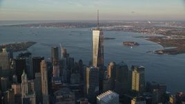 5.5K aerial stock footage of gleaming Freedom Tower at sunrise in Lower Manhattan, New York City Aerial Stock Footage | AX118_094E