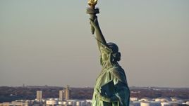 5.5K aerial stock footage orbit left side of the Statue of Liberty at sunrise in New York Aerial Stock Footage | AX118_113E