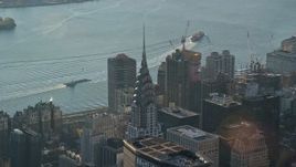 5.5K aerial stock footage of orbiting the Chrysler Building at sunrise in New York City Aerial Stock Footage | AX118_201E