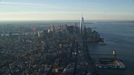 5.5K aerial stock footage of a wide view of Freedom Tower and Lower Manhattan at sunrise in New York City Aerial Stock Footage | AX118_208E