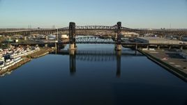 5.5K aerial stock footage approach small bridges at sunrise between Kearny and Newark, New Jersey Aerial Stock Footage | AX118_229