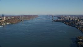 5.5K aerial stock footage approach George Washington Bridge in Autumn, New York City Aerial Stock Footage | AX119_040
