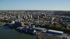 5.5K aerial stock footage of the riverfront downtown area of Yonkers, New York in Autumn Aerial Stock Footage | AX119_063E