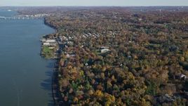 5.5K aerial stock footage approach small riverfront town of Irvington in Autumn, New York Aerial Stock Footage | AX119_082