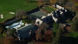 5.5K aerial stock footage orbit guest house at Kykuit Estate in Autumn, Westchester County, New York Aerial Stock Footage | AX119_098