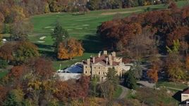 5.5K aerial stock footage of a historical mansion at country club in Autumn, Briarcliff Manor, New York Aerial Stock Footage | AX119_108E