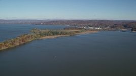 5.5K aerial stock footage of approaching Croton Point Park in Autumn, Croton on Hudson, New York Aerial Stock Footage | AX119_125E
