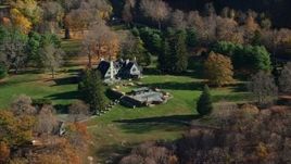 5.5K aerial stock footage orbit isolated mansion in Autumn, Garrison, New York Aerial Stock Footage | AX119_161
