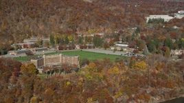 5.5K aerial stock footage of Thayer Hotel in Autumn, West Point, New York Aerial Stock Footage | AX119_163