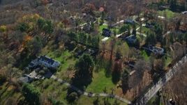 5.5K aerial stock footage fly over upscale suburban neighborhood in Autumn, Mt Kisco, New York Aerial Stock Footage | AX119_218
