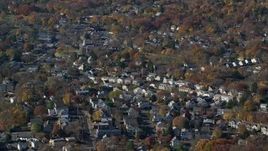 5.5K aerial stock footage orbit a small town neighborhood in Autumn, Greenwich, Connecticut Aerial Stock Footage | AX119_231