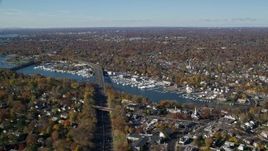5.5K aerial stock footage of a small town marina and neighborhood in Autumn, Greenwich, Connecticut Aerial Stock Footage | AX119_232