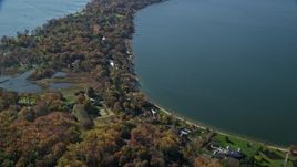 5.5K aerial stock footage fly over oceanfront mansions in Autumn, Oyster Bay, New York Aerial Stock Footage | AX119_239