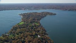 5.5K aerial stock footage of oceanfront mansions in Autumn, Oyster Bay, New York Aerial Stock Footage | AX119_240