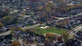 5.5K aerial stock footage of suburban neighborhoods in Autumn, Massapequa, New York Aerial Stock Footage | AX120_007