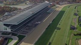 5.5K aerial stock footage of stands at a horse-racing track in Autumn, Elmont, New York Aerial Stock Footage | AX120_039