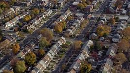 5.5K aerial stock footage of orbiting suburban tract homes in Autumn, Queens Village, Queens, New York City Aerial Stock Footage | AX120_043E