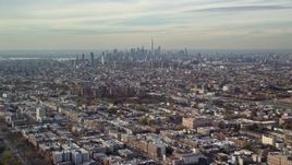 5.5K aerial stock footage of Lower Manhattan skyline seen from Brooklyn in Autumn, New York City Aerial Stock Footage | AX120_080