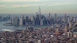 5.5K aerial stock footage of the towering Lower Manhattan skyline seen from Brooklyn in Autumn, New York City Aerial Stock Footage | AX120_086
