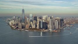 5.5K aerial stock footage of approach Lower Manhattan and Battery Park in Autumn, New York City Aerial Stock Footage | AX120_121E