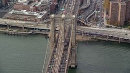 5.5K aerial stock footage orbit heavy traffic on the Brooklyn Bridge, New York City Aerial Stock Footage | AX120_136