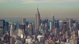 5.5K aerial stock footage wide orbit of the Empire State Building in Midtown, New York City Aerial Stock Footage | AX120_139