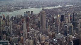5.5K aerial stock footage orbit Empire State Building and skyscrapers in Midtown, New York City Aerial Stock Footage | AX120_173