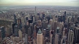 5.5K aerial stock footage of a wide orbit Midtown skyscrapers and high-rises in New York City Aerial Stock Footage | AX120_174E