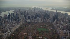 5.5K aerial stock footage fly over Central Park and approach Midtown in Autumn, New York City Aerial Stock Footage | AX120_219E