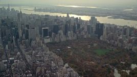 5.5K aerial stock footage approach Midtown skyscrapers by Central Park in Autumn, New York City Aerial Stock Footage | AX120_232