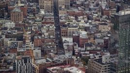 5.5K aerial stock footage orbit apartment buildings and busy street In Soho, New York City Aerial Stock Footage | AX120_244