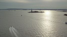 5.5K aerial stock footage of a wide view of the Statue of Liberty in Autumn, New York Aerial Stock Footage | AX120_250