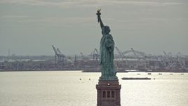 5.5K aerial stock footage orbit and approach the Statue of Liberty in Autumn, New York Aerial Stock Footage | AX120_251E