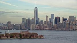 5.5K aerial stock footage of Ellis Island and Lower Manhattan skyline in Autumn, New York City Aerial Stock Footage | AX120_258