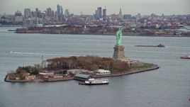 5.5K aerial stock footage orbit Liberty Island and Statue of Liberty in Autumn, New York Aerial Stock Footage | AX120_262