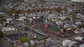 5.5K aerial stock footage orbit a church and high school in Autumn, Jersey City, New Jersey Aerial Stock Footage | AX120_268