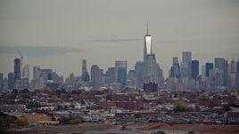 5.5K aerial stock footage of the Lower Manhattan skyline seen from New Jersey in Autumn Aerial Stock Footage | AX120_273