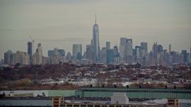5.5K aerial stock footage of Freedom Tower and Lower Manhattan skyline seen from Jersey City in Autumn Aerial Stock Footage | AX120_274
