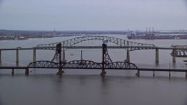5.5K aerial stock footage of the Newark Bay Bridge and Lehigh Valley Bridge at twilight, New Jersey Aerial Stock Footage | AX121_005E
