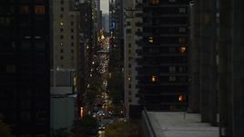 5.5K aerial stock footage of high-rises and congested streets in Midtown at twilight in New York City Aerial Stock Footage | AX121_065E