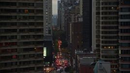5.5K aerial stock footage of Midtown city canyons and reveal UN Building at twilight in New York City Aerial Stock Footage | AX121_068E