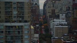 5.5K aerial stock footage flyby city canyons in Midtown at twilight in New York City Aerial Stock Footage | AX121_071E