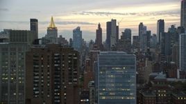 5.5K aerial stock footage of Midtown skyscrapers at twilight in New York City Aerial Stock Footage | AX121_073E