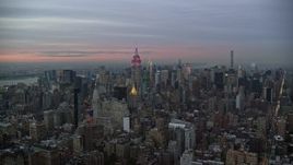 5.5K aerial stock footage approach Empire State Building and Midtown skyscrapers at twilight in New York City Aerial Stock Footage | AX121_078E