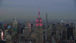 5.5K aerial stock footage orbit top of Empire State Building at twilight in New York City Aerial Stock Footage | AX121_083