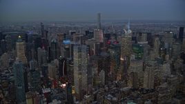 5.5K aerial stock footage orbit Midtown skyscrapers at twilight in New York City Aerial Stock Footage | AX121_087E