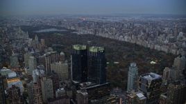 5.5K aerial stock footage approach Time Warner Center and Central Park at twilight in New York City Aerial Stock Footage | AX121_091E