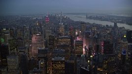 5.5K aerial stock footage fly over Midtown near Times Square at twilight in New York City Aerial Stock Footage | AX121_102E