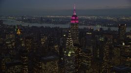 5.5K aerial stock footage of the Empire State and Chrysler Buildings at twilight in New York City Aerial Stock Footage | AX121_124E