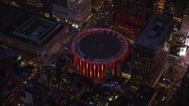 5.5K aerial stock footage orbit of Madison Square Garden at twilight in Midtown Manhattan, New York City Aerial Stock Footage | AX121_129